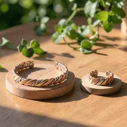Ella's Evora copper cuff and matching tri-metal ring on wooden discs