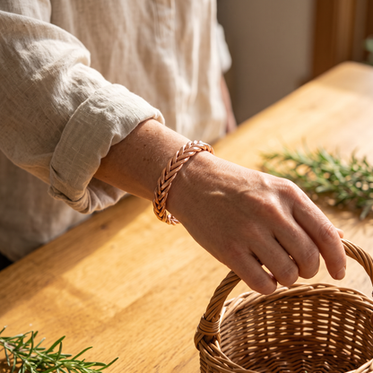 Clay copper cuff worn by a woman